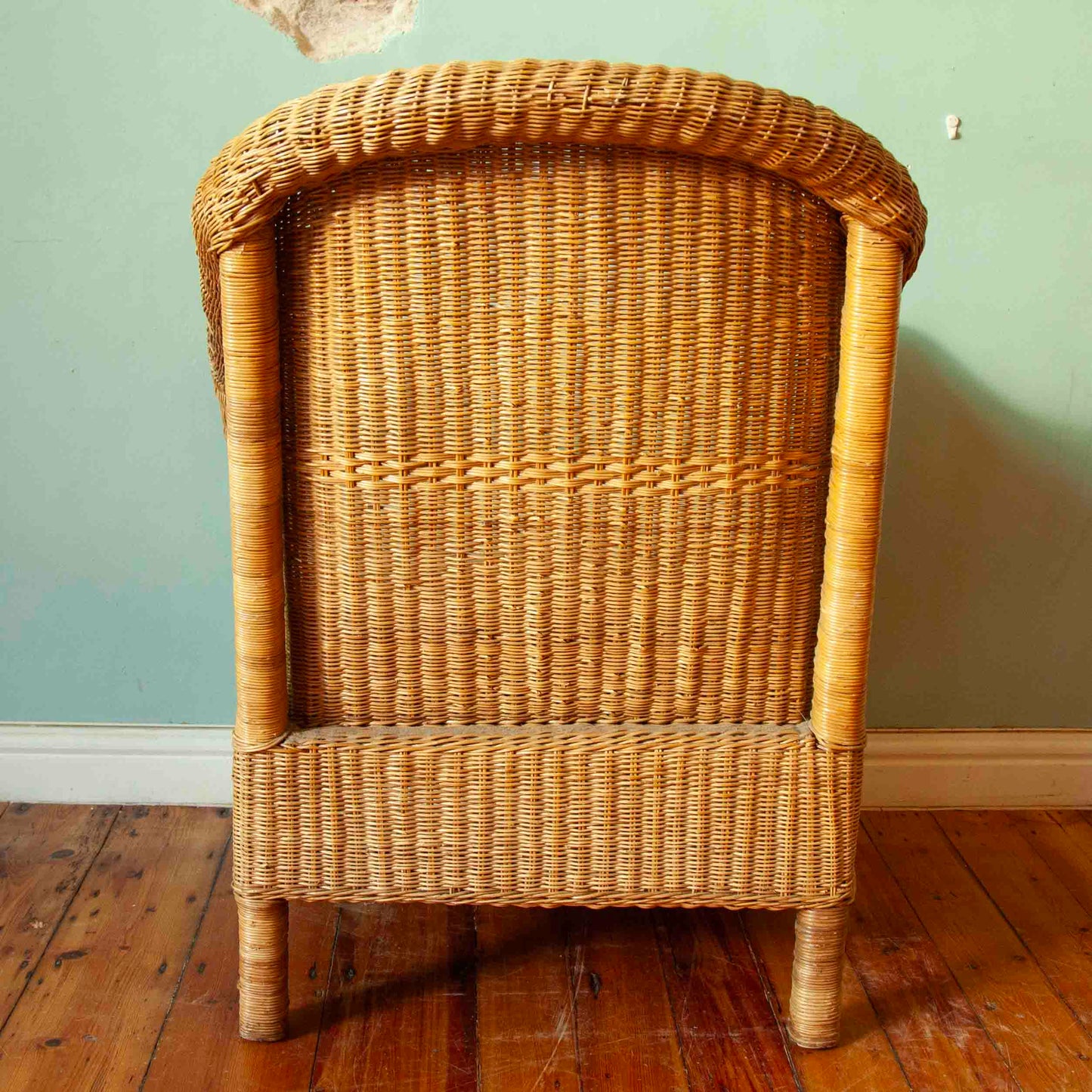 Cane armchair